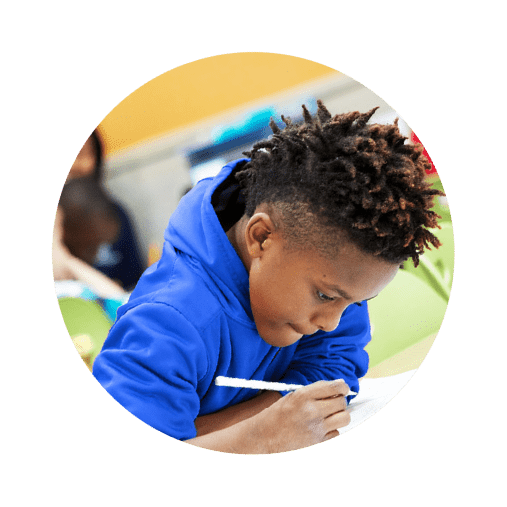 boys and girls club of Oklahoma county boy writing in circle