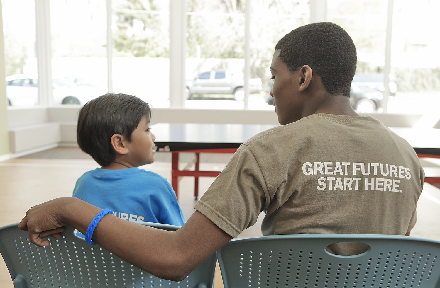 boy and mentor sitting together