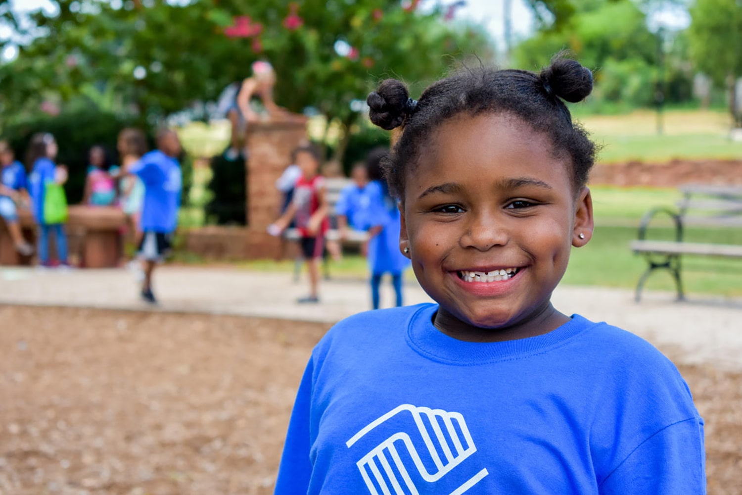 girl on field trip smiling